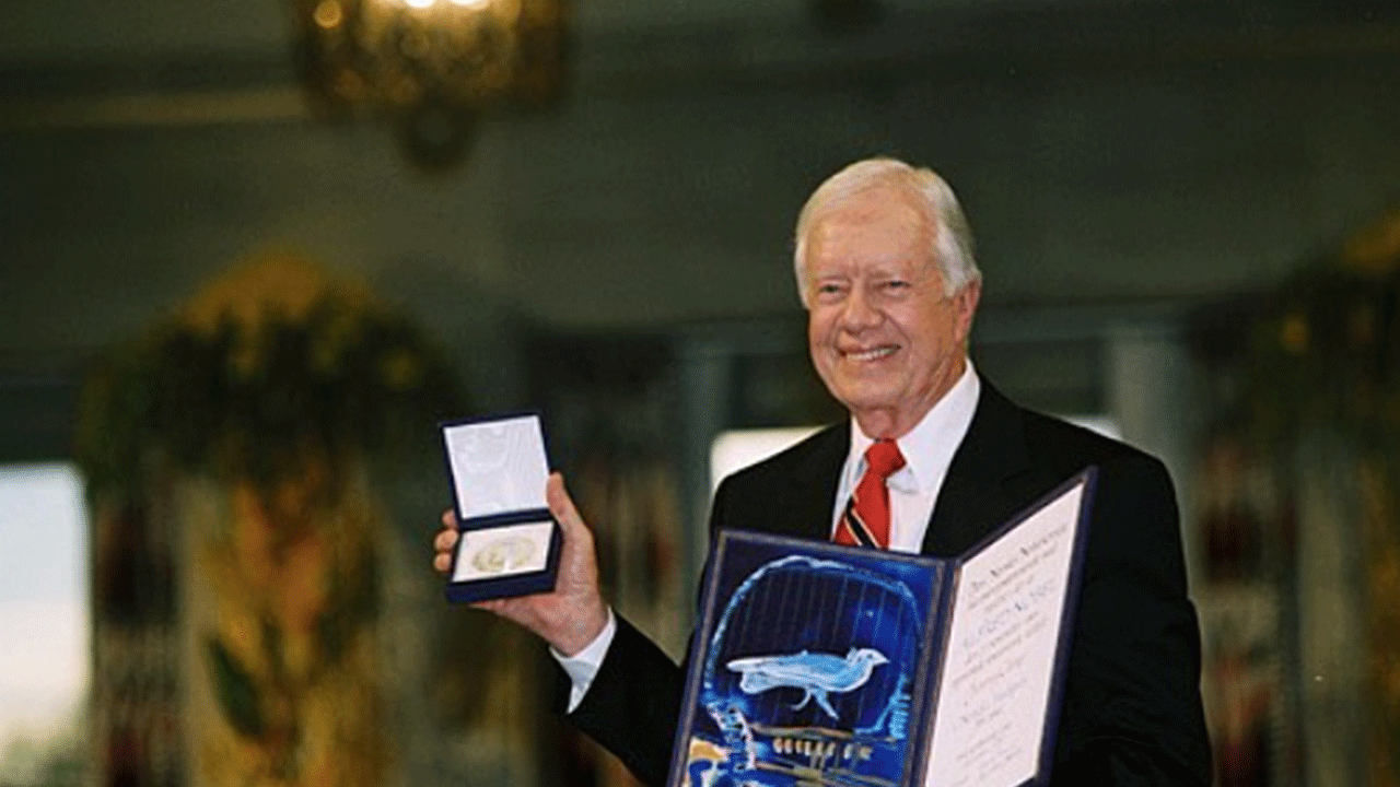 Jimmy Carter displaying Nobel Peace Prize