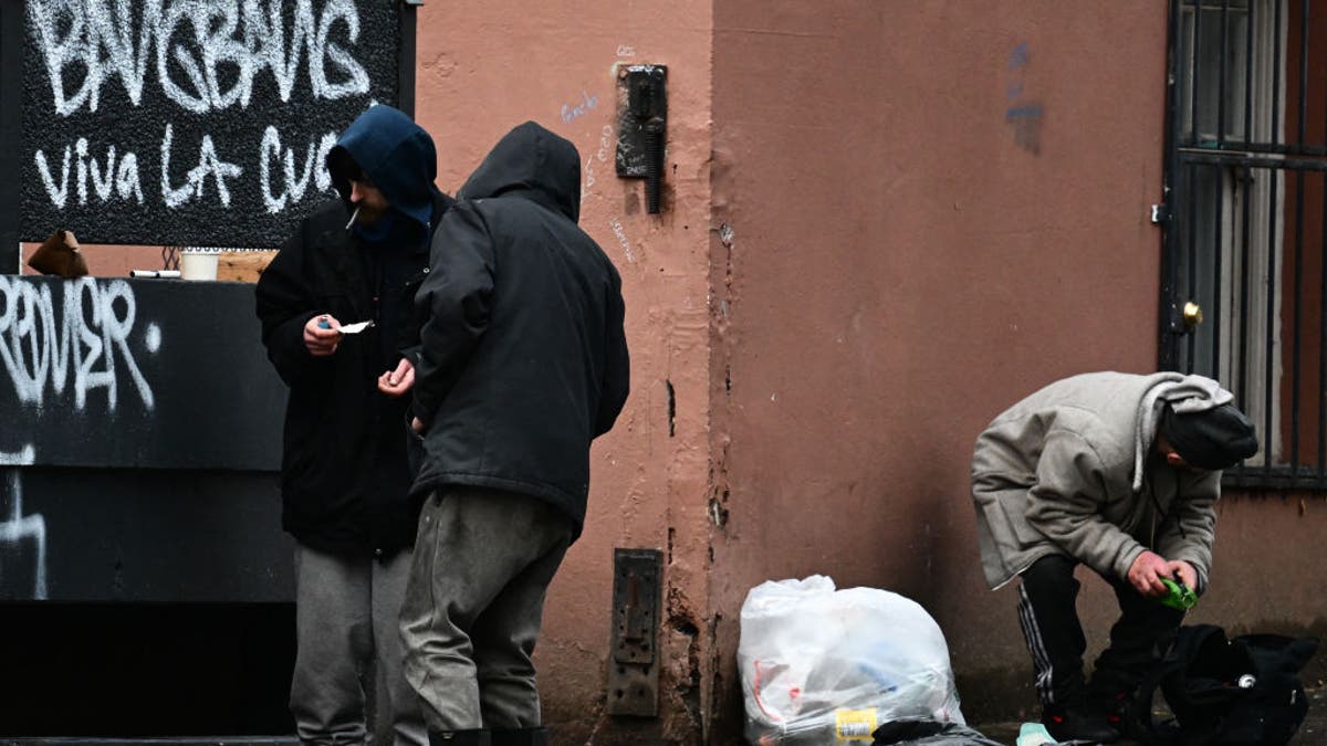 Person doing drugs on street