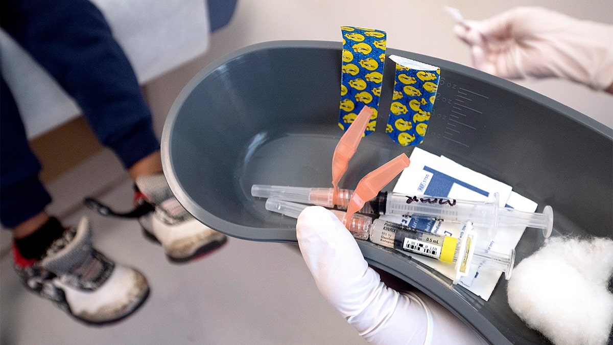 a tray holding vaccines