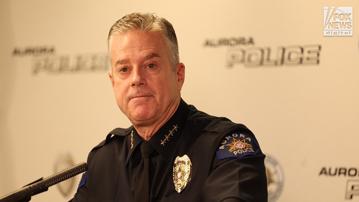 Aurora Police Department Chief Todd Chamberlain speaks to the media during a press conference