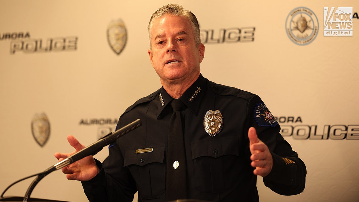 Aurora Police Department Chief Todd Chamberlain speaks to the media during a press conference