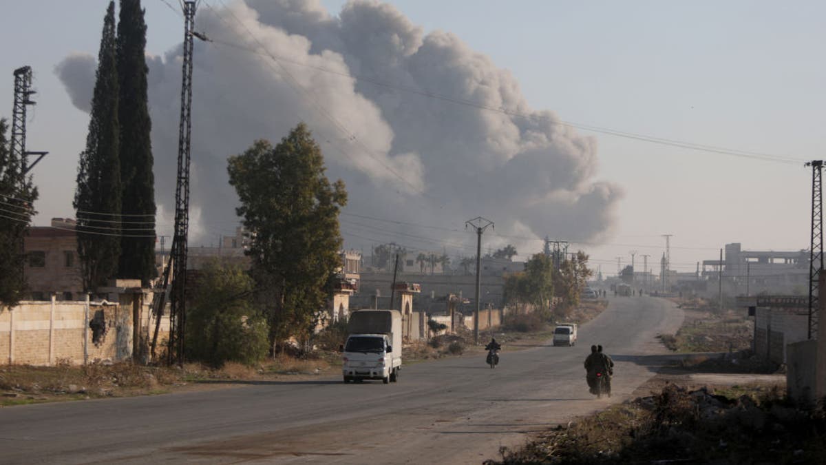 Rebel fighters in Aleppo