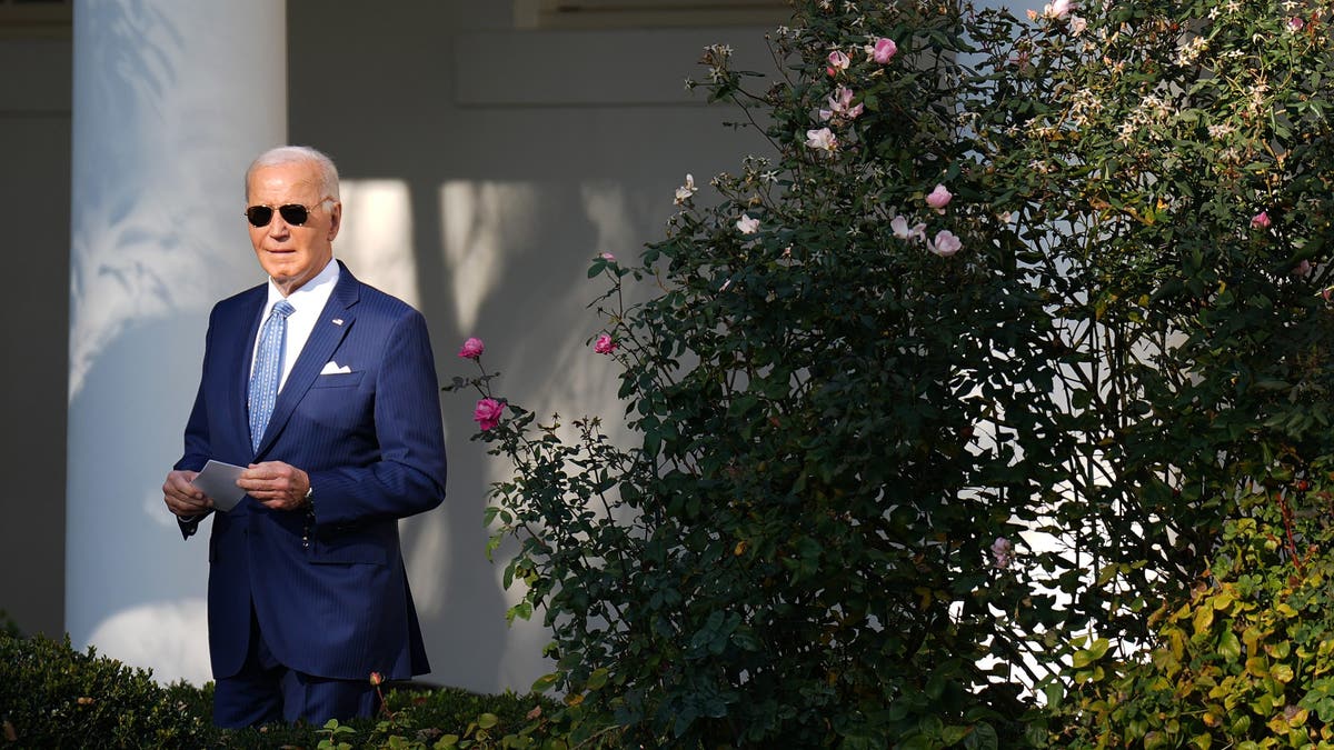 President Biden walks to the Oval Office before pardoning the National Thanksgiving turkeys, Blossom and Peach, during a ceremony on the South Lawn of the White House on Nov. 25, 2024 in Washington, D.C.