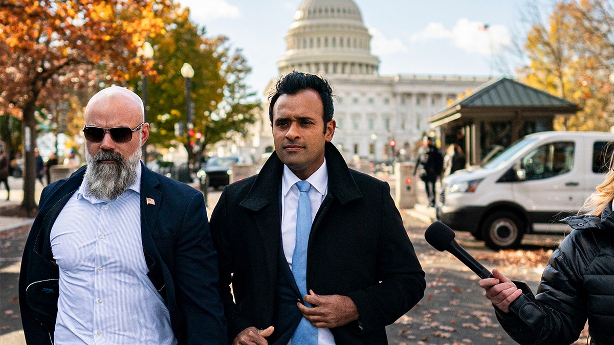 Vivek Ramaswamy, chairman and co-founder of Strive Asset Management, center, arrives to meet with lawmakers on Capitol Hill in Washington, D.C., on Thursday, Dec. 5, 2024.