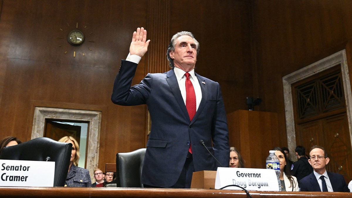 Former North Dakota Governor Doug Burgum is sworn in during a Senate Energy and Natural Resources Committee hearing on his nomination to be Secretary of the Interior, on Capitol Hill in Washington, D.C., on Jan. 16, 2025.