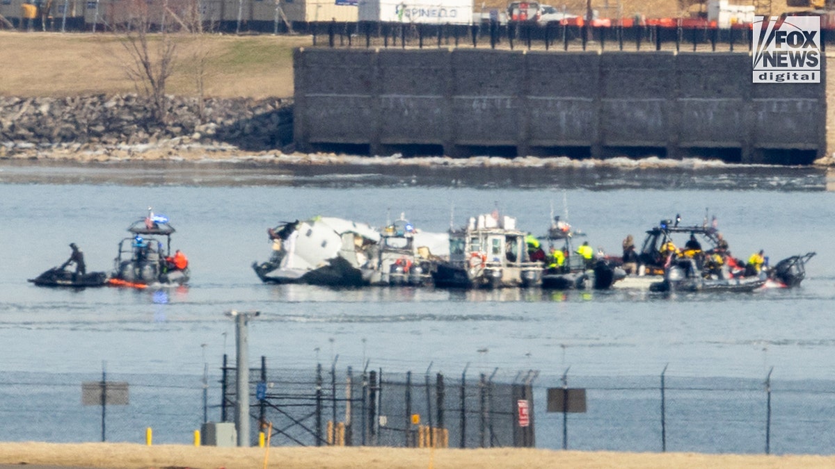 Search efforts in DC after a collision between an American Airlines jet and a U.S. Black Hawk helicopter