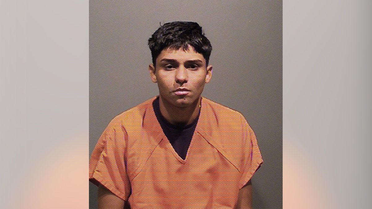 Anderson Zambrano-Pacheco wears an orange shirt in his mugshot.