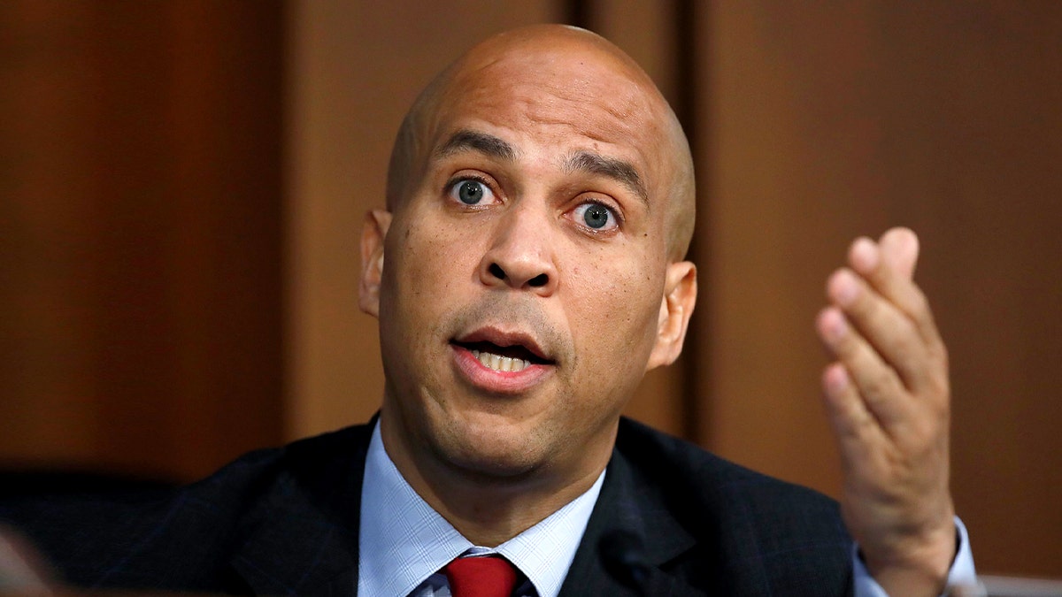 Cory Booker gestures during senate hearing