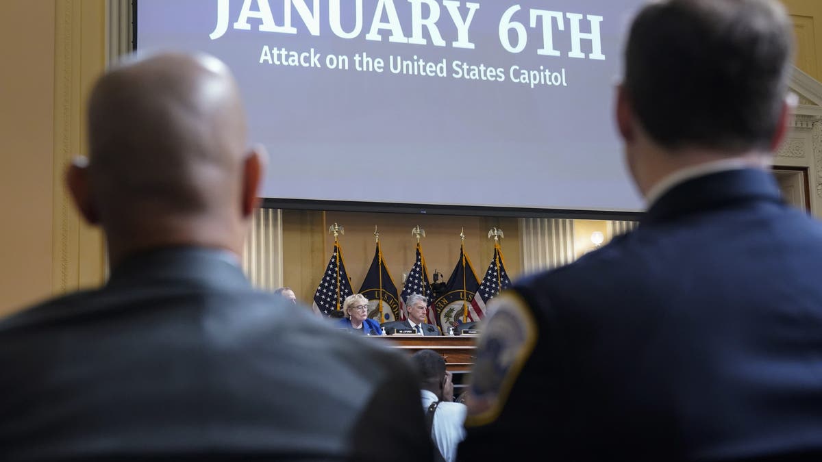 U.S. Capitol Police Sgt. Aquilino Gonell, left, and Washington Metropolitan Police Department officer Daniel Hodges listen as the House select committee investigating the Jan. 6 attack on the U.S. Capitol holds a hearing on Capitol Hill in Washington, Oct. 13, 2022.