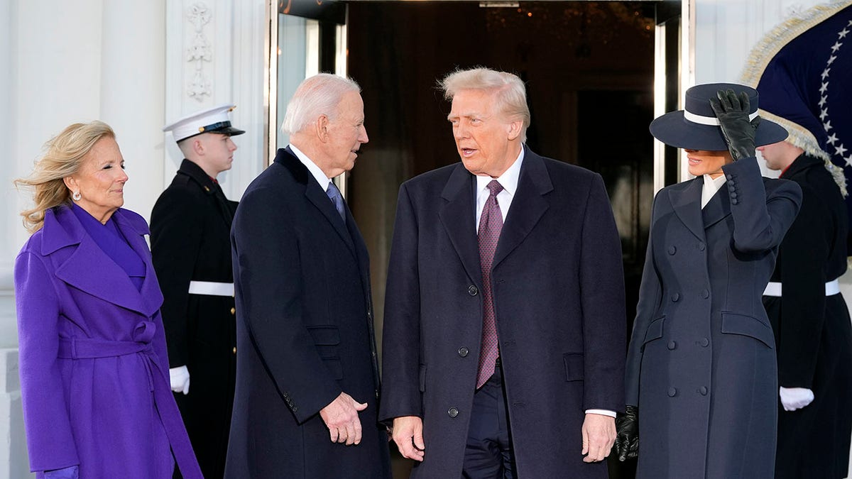 Bidens and Trumps on White House steps