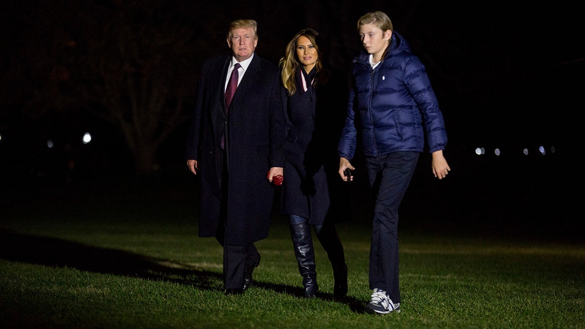 Barron Trump with his parents