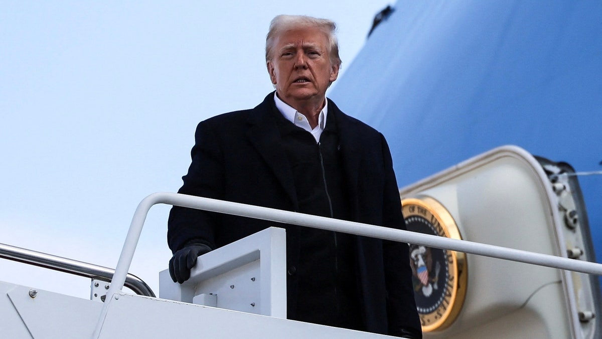 President Donald Trump boards Air Force One for the first time since his inauguration