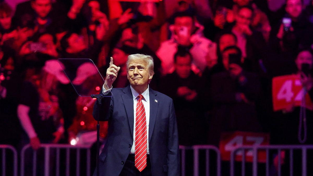 Donald Trump gestures during a rally the day before he is scheduled to be inaugurated for a second term