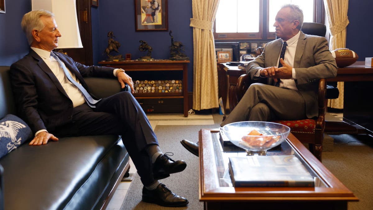 Robert F. Kennedy Jr., right, President-elect Donald Trump's nominee to be secretary of Health and Human Services, meets with Sen. Tommy Tuberville (R-AL) office in the Senate Office Building on Dec. 17, 2024 in Washington, D.C.