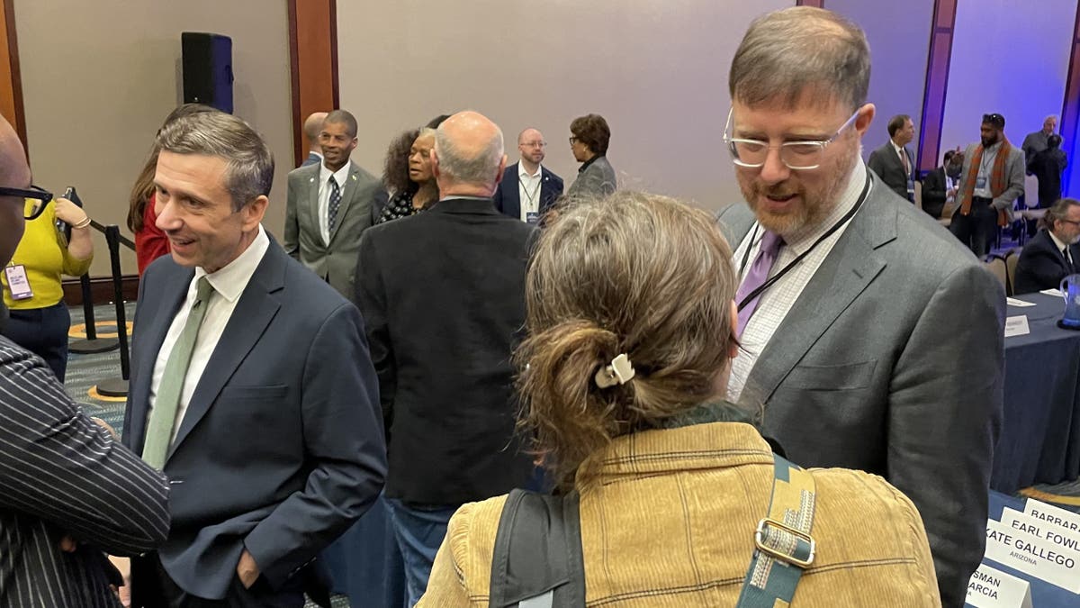 Minnesota Democratic Party chair Ken Martin (left) and Wisconsin chair Ben Wikler (right), two leading contenders in the Democratic National Committee chair race, at the DNC executive committee meeting, on Dec. 12, 2024, in Washington, D.C. 