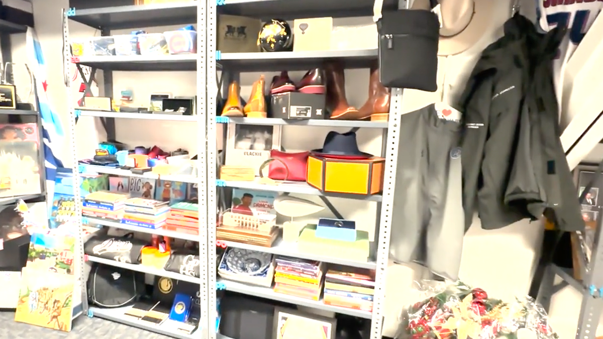 Shoes, coats, books and other items are seen inside the City of Chicago gift room