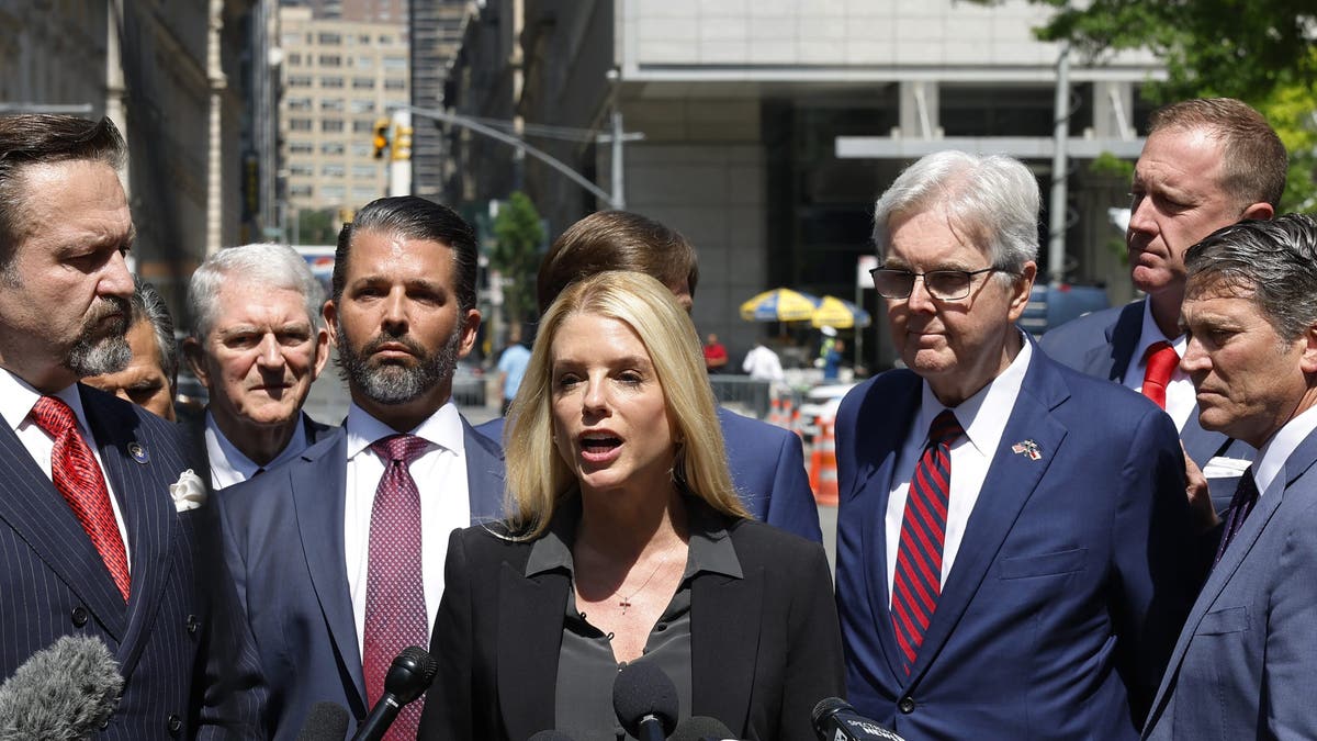 Pam Bondi speaks at a press conference