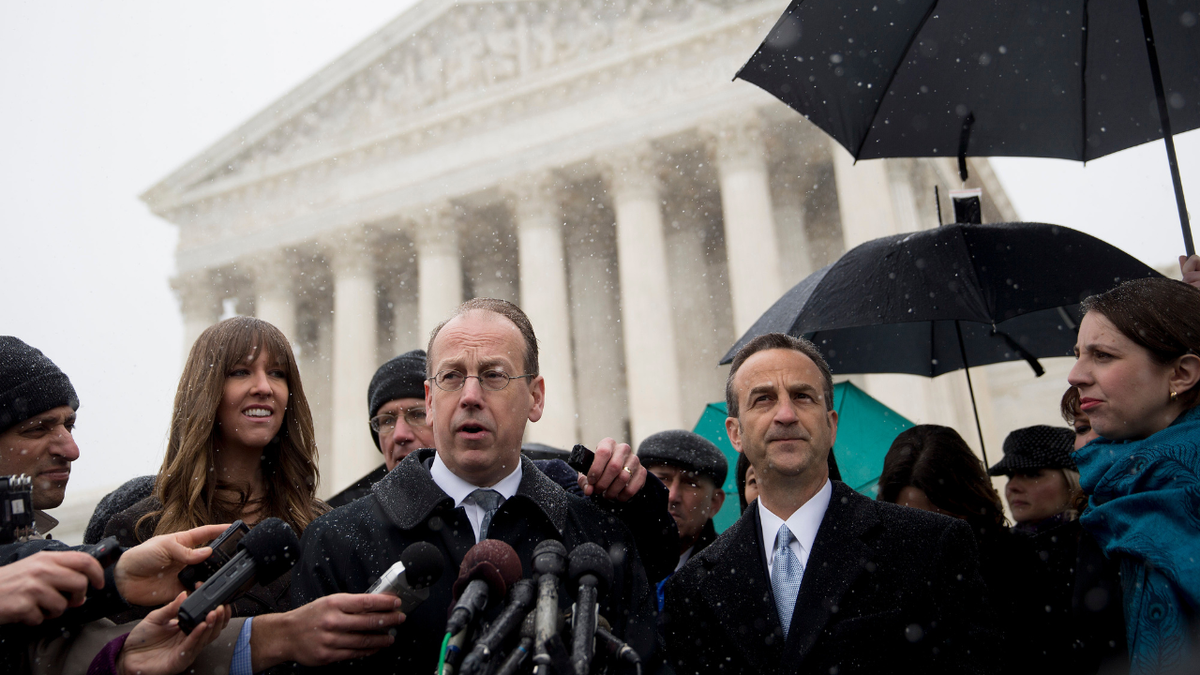 Paul Clement speaks to reporters outside the U.S. Supreme Court building