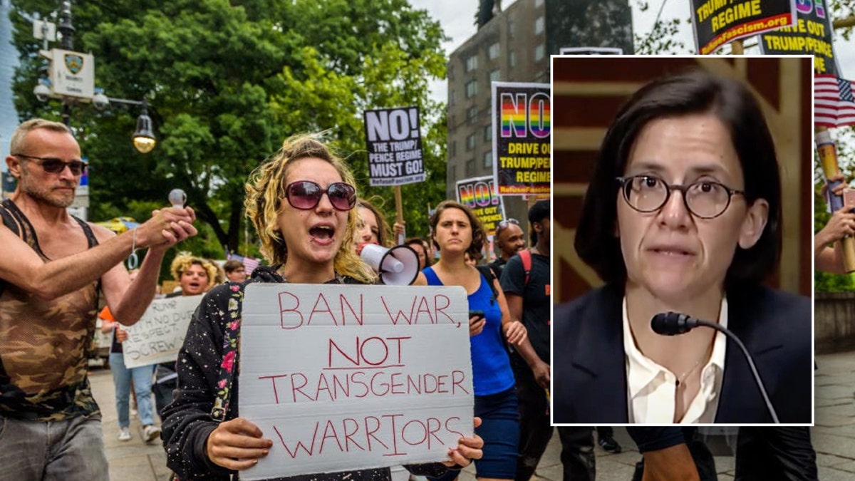 U.S. District Judge Ana Reyes is pictured with a group of protesters