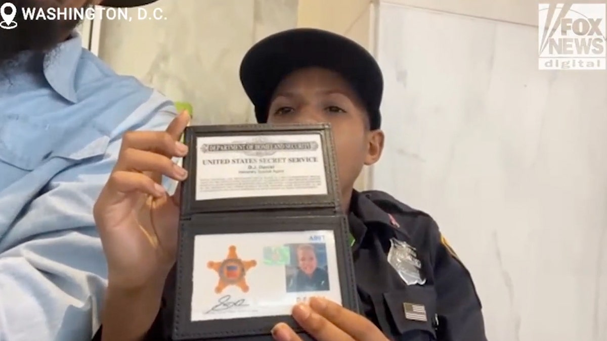 DJ Daniel shows off his custom Secret Service badge