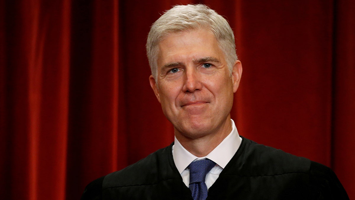 Justice Neil Gorsuch smiling