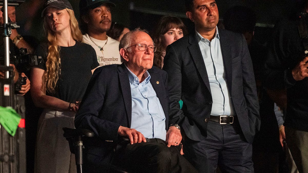 Bernie sanders sits at Coachella after addressing crowd