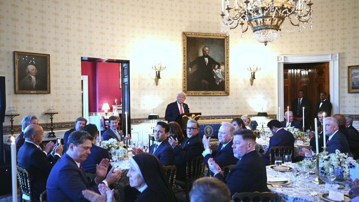 President Donald Trump speaks at an Easter prayer service and dinner in the Blue Room of the White House in Washington, Wednesday, April 16, 2025. (Pool via AP)