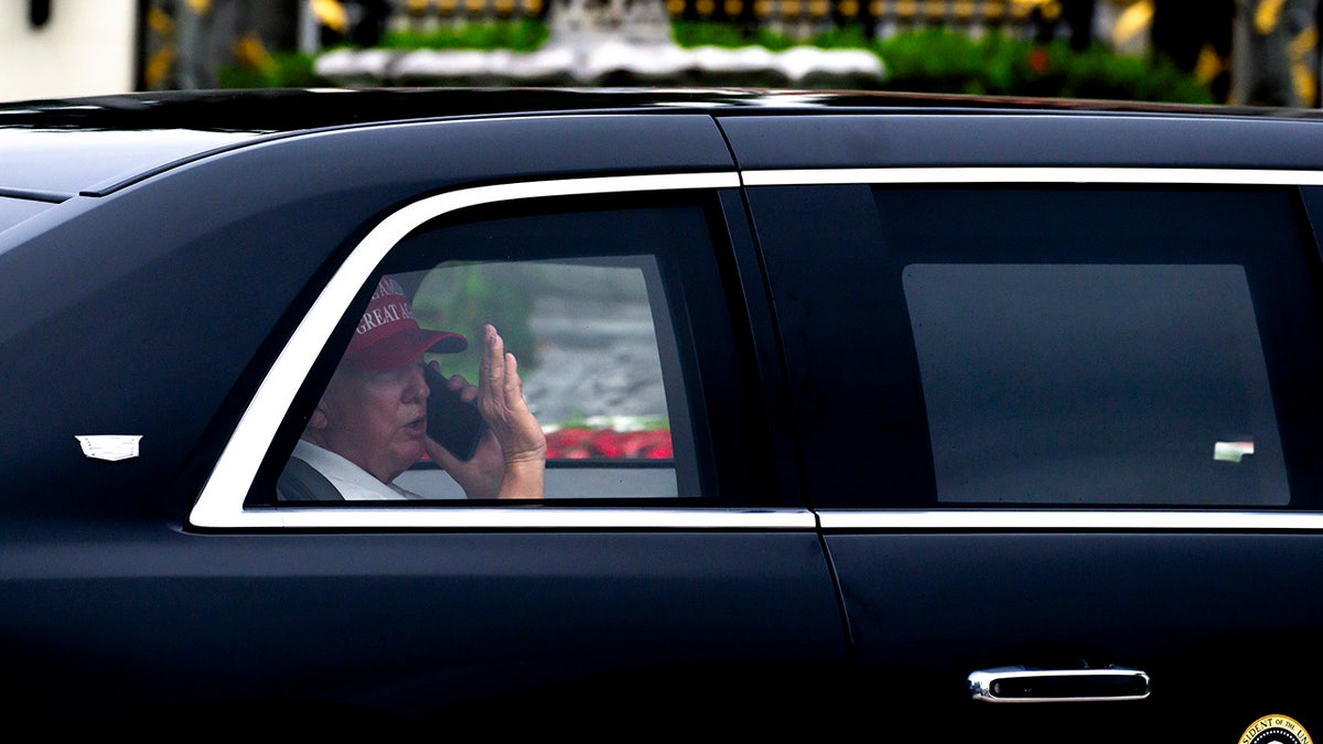Donald Trump waves to supporters
