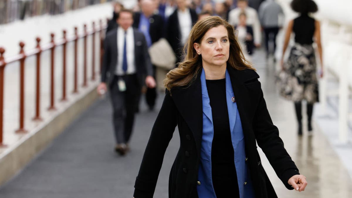 Nancy Mace walks to House chamber