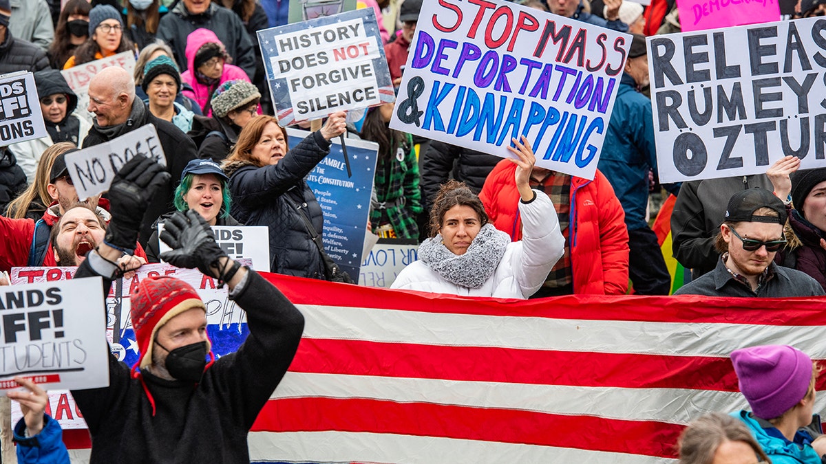 Protesters demand an end to Trump's deportations