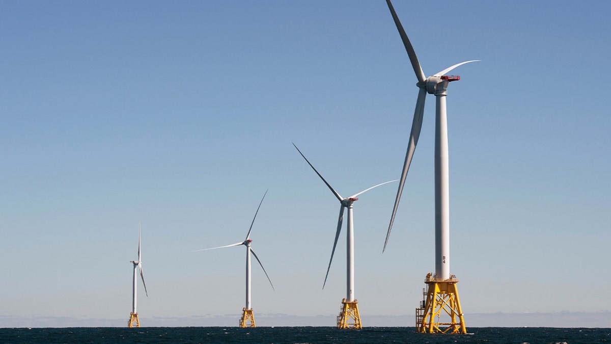 Wind turbines, of the Block Island Wind Farm, tower above the water on October 14, 2016 off the shores of Block Island, Rhode Island. (Photo credit should read DON EMMERT/AFP via Getty Images)