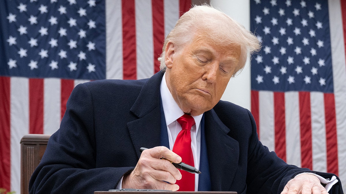 President Donald Trump signs executive order