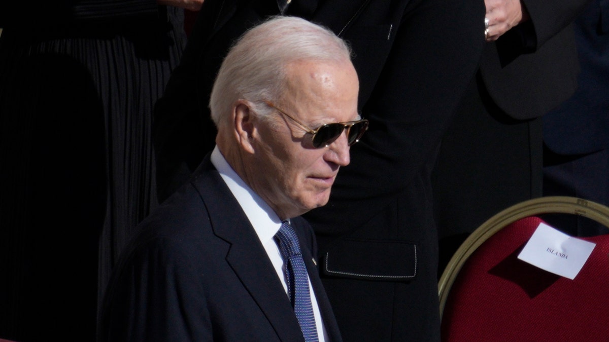 Joe Biden wearing a dark suit