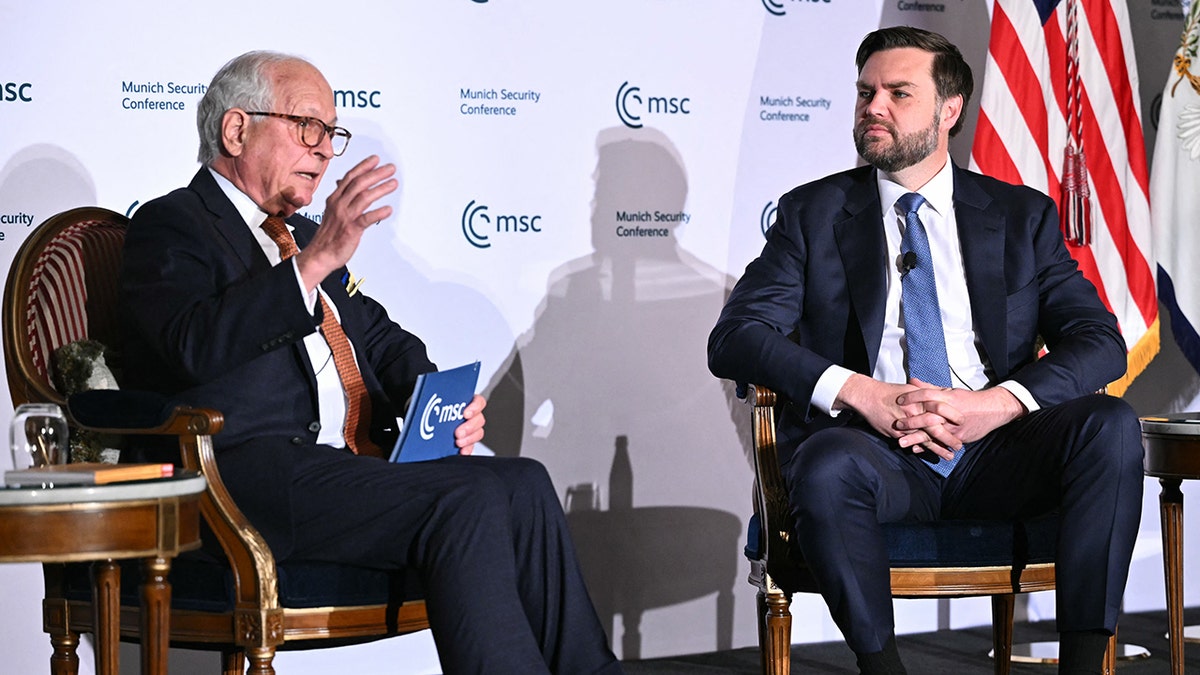 Vance and Munich Security Conference official at DC event on stage