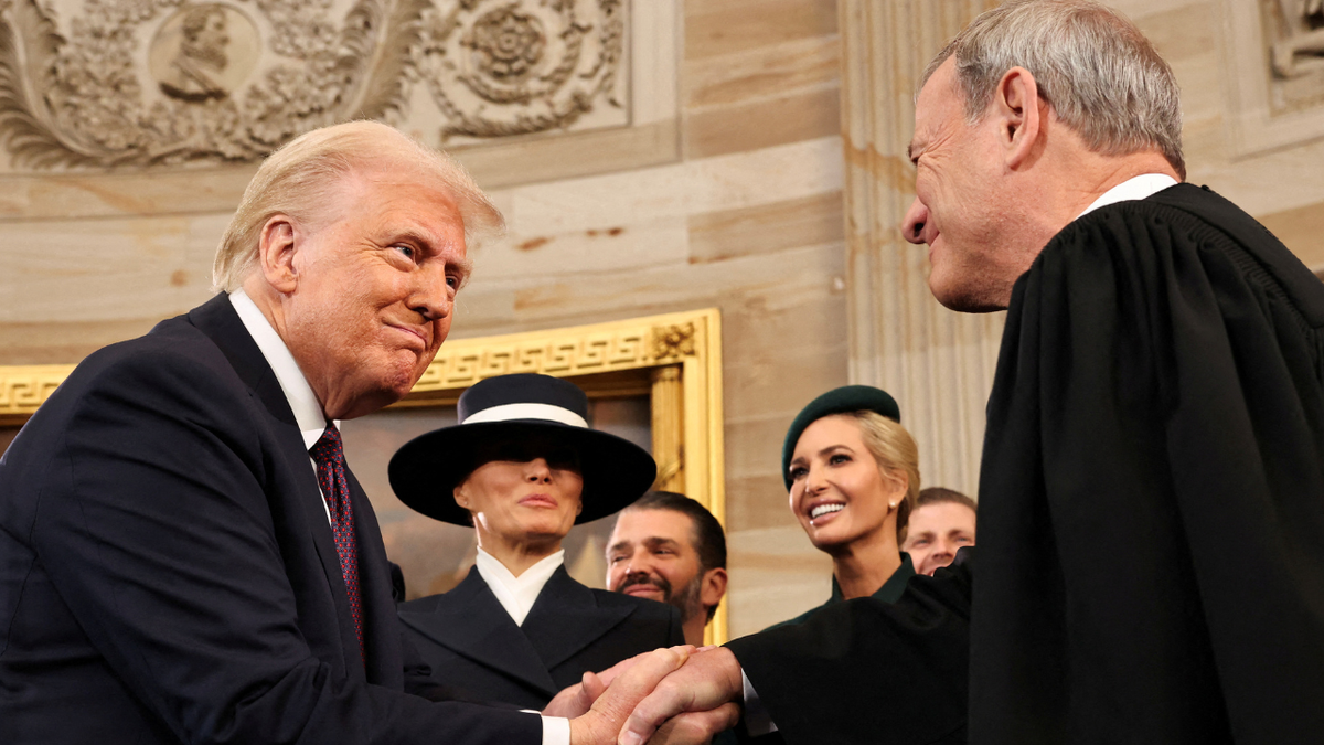 President Trump shaking Chief Justice Roberts' hand