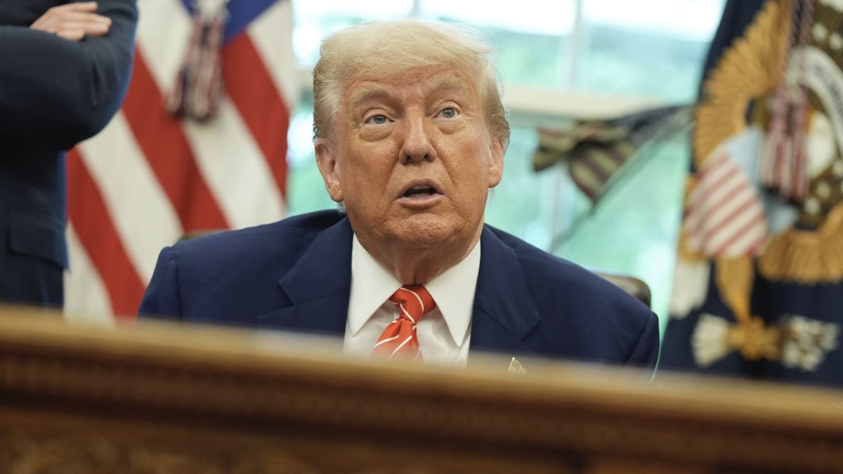 President Donald Trump speaks with reporters after announcing a trade deal with the U.K. in the Oval Office of the White House in Washington, D.C., on May 8.