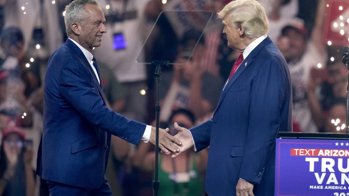 Trump, RFK Jr shake hands on stage