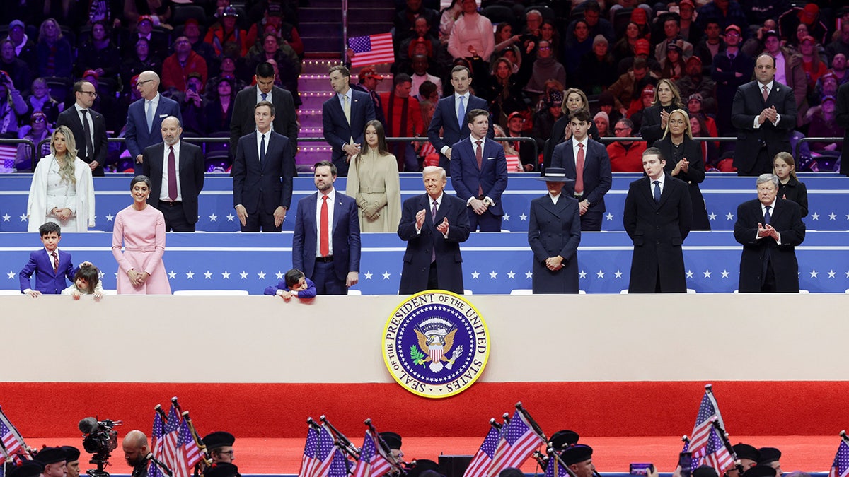 U.S. President Donald Trump, first lady Melania Trump. U.S. Vice President J.D. Vance, second lady Usha Vance, their children Ewan, Vivek and Mirabel, Barron Trump, and Viktor Knavs attend a rally