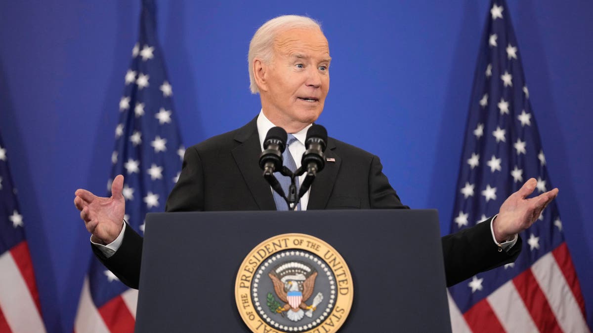 Biden speaking with his hands raised