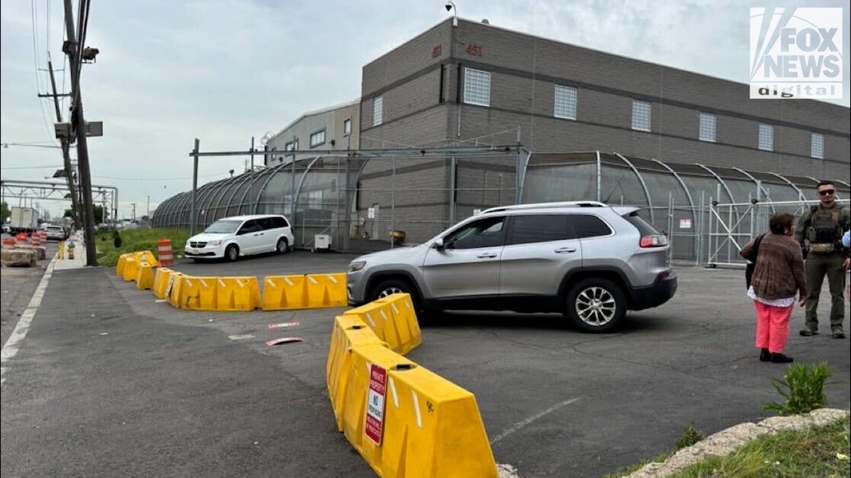 building of Ice detention center in Newark with barricades surrounding perimeter