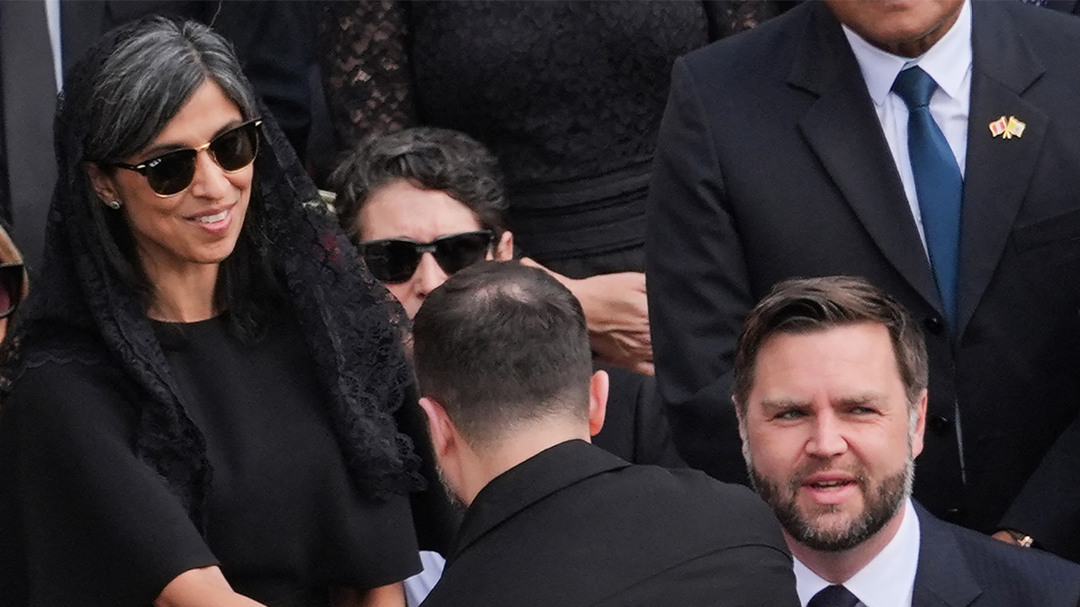 Ukraine's President Volodymyr Zelensky (C) is greeted by US Vice President JD Vance (R) and Seond Lady Usha Vance prior to a Holy Mass for the Beginning of the Pontificate of Pope Leo XIV, in St Peter's square in The Vatican on May 18, 2025. (Photo by Jacquelyn Martin / POOL / AFP) (Photo by JACQUELYN MARTIN/POOL/AFP via Getty Images)