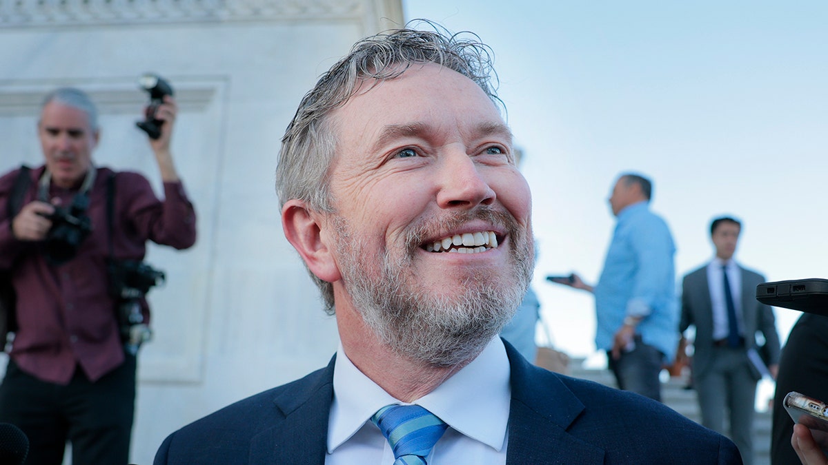 Rep. Thomas Massie talks to reporters