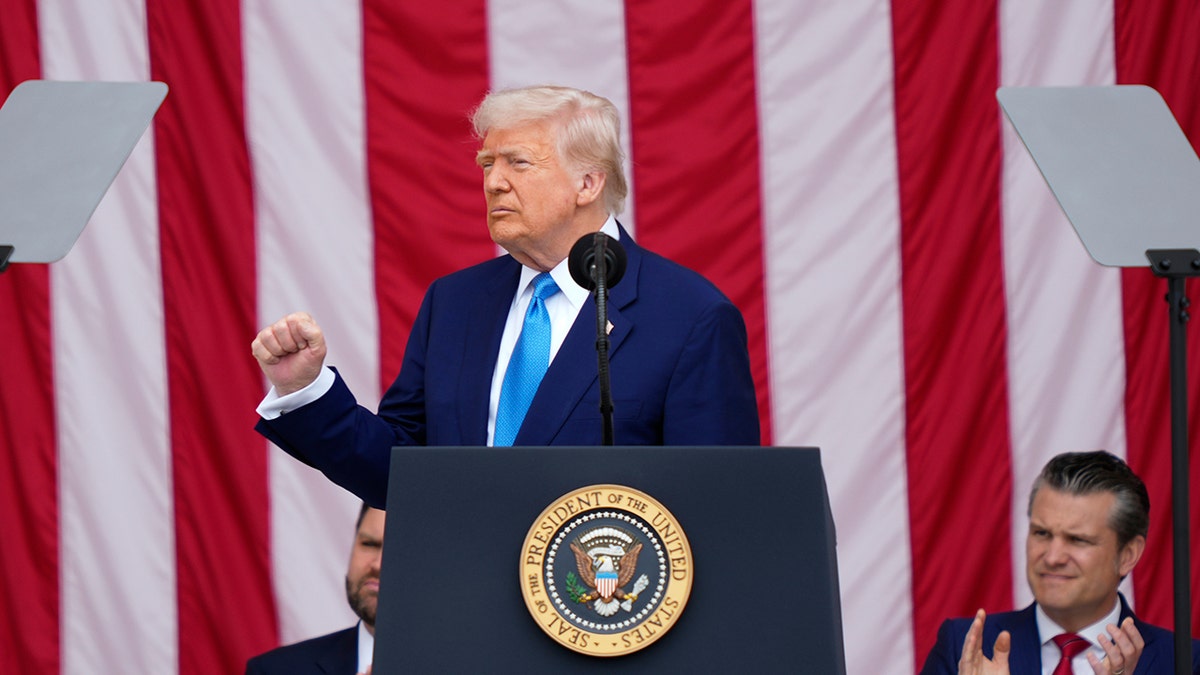 Trump pumps first at Memorial Day address