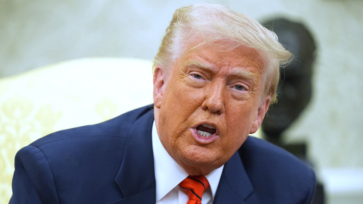 Trump sits in Oval Office during meeting with Canadian PM Carney, not pictured