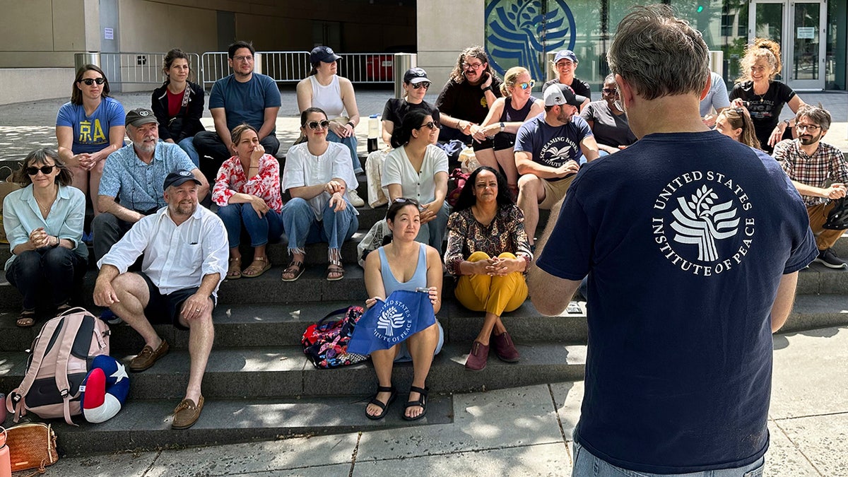 U.S. Institute of Peace workers outside building