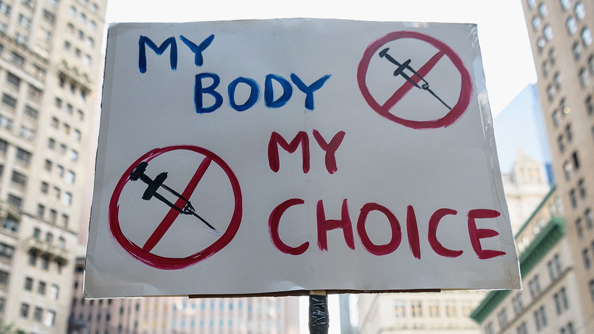 protest sign: my body, my choice, but protesting vaccines