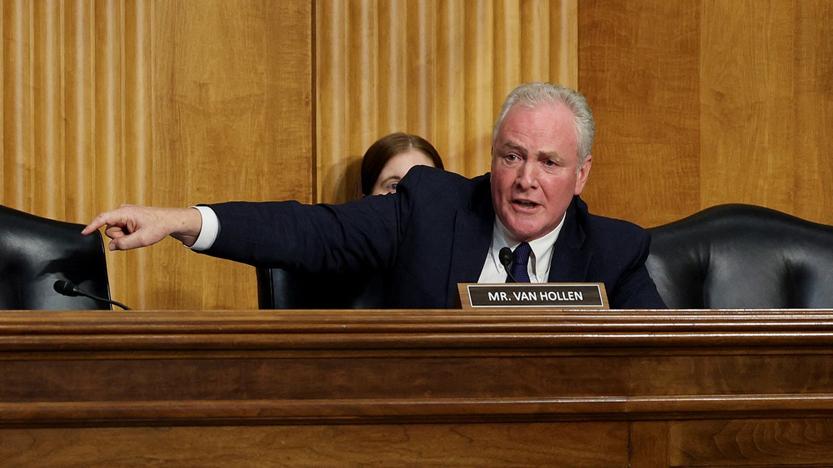 Senator Chris Van Hollen pointing at hearing