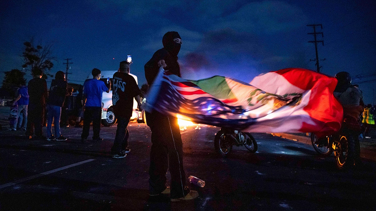 LA rioter with a US-Mexico flag
