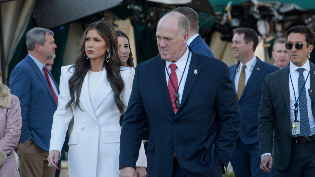 Homeland Security Secretary Kristi Noem, left, and White House border czar Tom Homan walk at the White House in Washington, Wednesday, Jan. 29, 2025. 