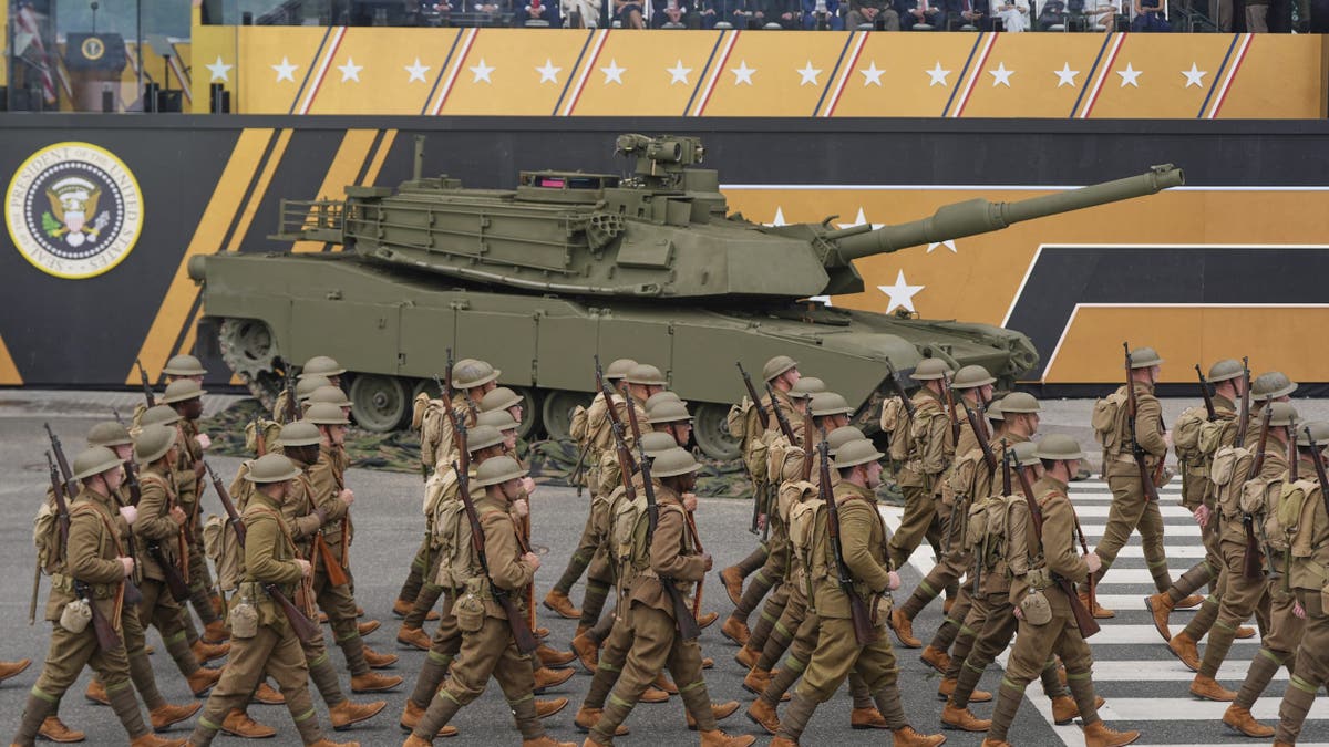Soldiers from the Army 82nd Airborne Division, dressed in World War I era uniforms, march past the reviewing stand and President Donald Trump during a military parade commemorating the Army's 250th anniversary, coinciding with his 79th birthday, Saturday, June 14, 2025, in Washington. 